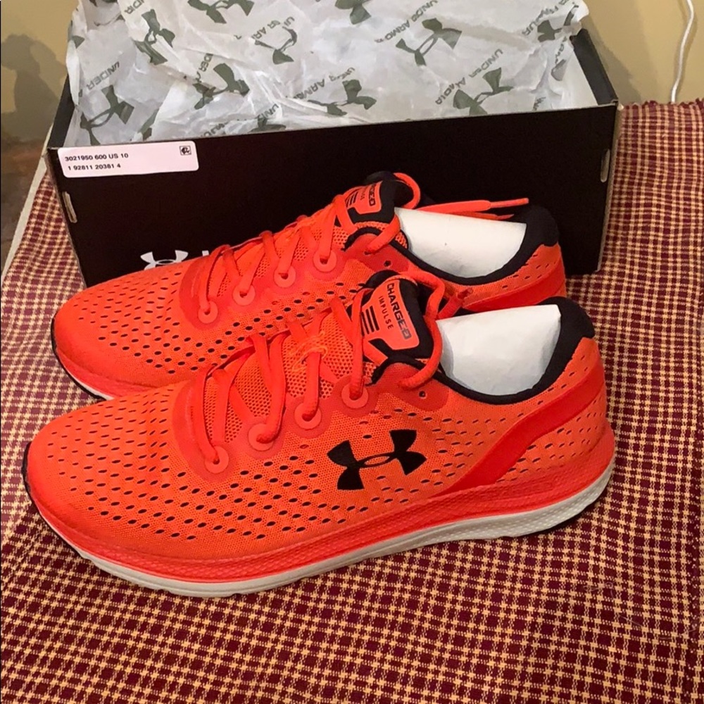 Worn 3 times,  Under Armour Red men’s size 10